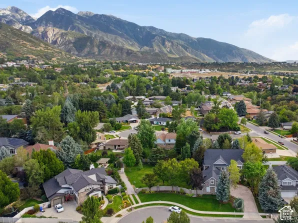 Aerial view of Top of the World homes in Cottonwood Heights below the Wasatch Mountains